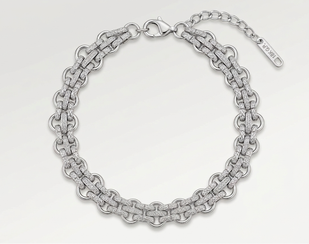 Silver chain bracelet on a white background